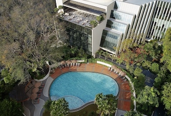 Outdoor pool, open 6:00 AM to 9:00 PM, pool umbrellas, sun loungers