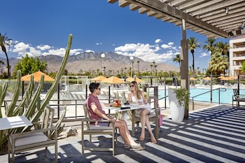 Outdoor pool, open 10:00 AM to 10:00 PM, cabanas (surcharge)