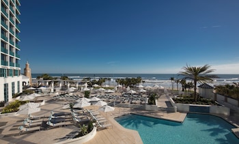 2 outdoor pools, pool umbrellas, sun loungers