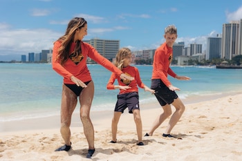 On the beach, beach towels, snorkeling, surfing