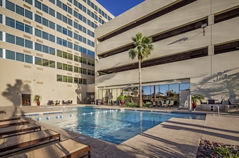 Outdoor pool, open 6:00 AM to 10:00 PM, sun loungers