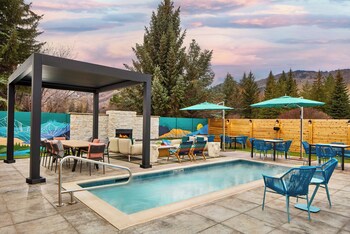 Indoor pool, outdoor pool, open 6:00 AM to 11:00 PM, pool umbrellas