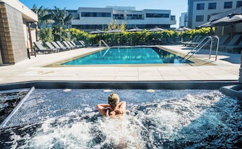 Designer toiletries, hair dryer, bathrobes, slippers