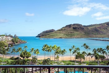 On the beach, beach cabanas, sun loungers, beach umbrellas