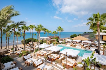 2 outdoor pools, pool umbrellas, sun loungers