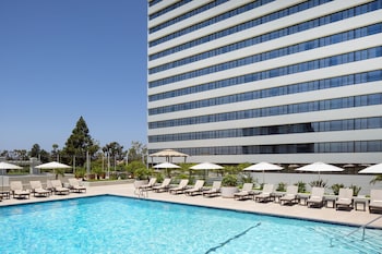 Outdoor pool, open 5:30 AM to 11:00 PM, pool cabanas (surcharge)