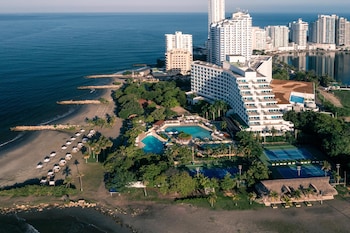 Beach nearby, black sand, sun loungers, beach umbrellas