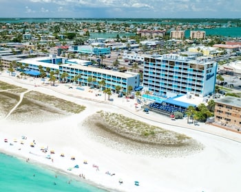 On the beach, white sand, beach towels, beach bar