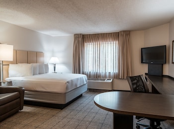 Suite, 2 Queen Beds | Desk, laptop workspace, iron/ironing board, free WiFi