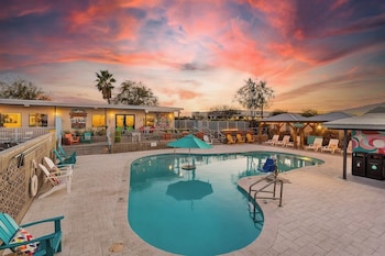 Outdoor pool, a heated pool, open 8:00 AM to 11:00 PM, free cabanas