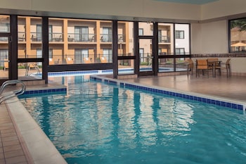 Indoor pool, outdoor pool, open 10:00 AM to 10:00 PM, sun loungers