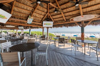 On the beach, sun-loungers, beach umbrellas, beach towels