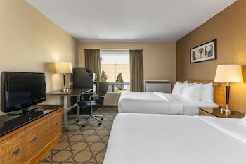 Premium bedding, pillow-top beds, desk, blackout curtains