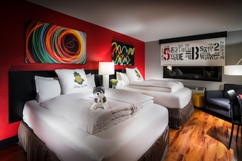 Premium bedding, down duvets, pillow-top beds, in-room safe