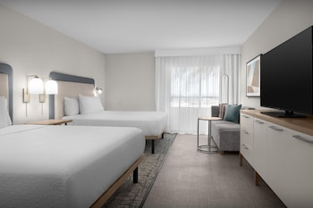 Outdoor pool, open 9:00 AM to 10:00 PM, pool umbrellas, pool loungers