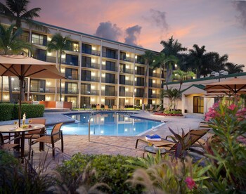 Outdoor pool, open 7:00 AM to 11:00 PM, sun loungers