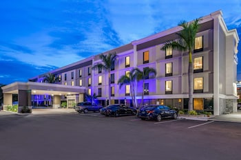 Outdoor pool, open 8:00 AM to 10:00 PM, pool umbrellas, sun loungers