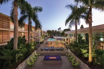 Outdoor pool, open 9:00 AM to 10:00 PM, free cabanas, sun loungers