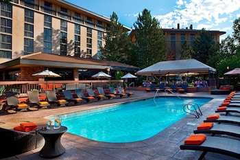 Indoor pool, seasonal outdoor pool, pool umbrellas, pool loungers