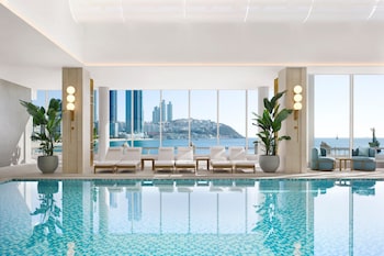 Indoor pool, open 6:00 AM to 10:00 PM, pool loungers