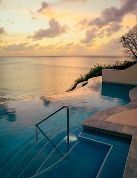 3 outdoor pools, open 7:00 AM to 7:00 PM, pool umbrellas, pool loungers