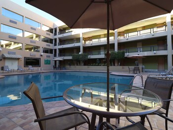Outdoor pool, pool umbrellas, sun loungers