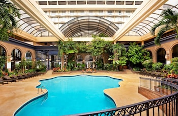 Indoor pool, a heated pool, open 7:00 AM to 10:00 PM, sun loungers