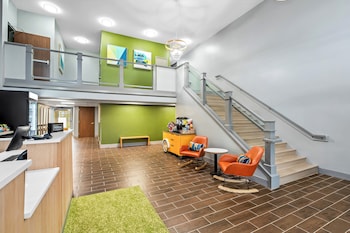 Desk, blackout drapes, iron/ironing board, free cribs/infant beds