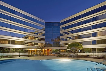 Outdoor pool, open 9:00 AM to 9:00 PM, pool umbrellas, sun loungers