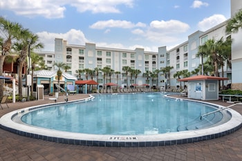 Outdoor pool, a heated pool, pool umbrellas, sun loungers