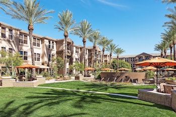 Outdoor pool, open 6 AM to 10:00 PM, pool umbrellas, sun loungers