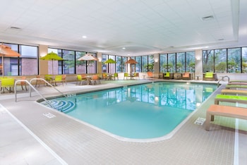 Indoor pool, open 6:00 AM to 10:30 PM, pool umbrellas