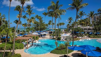 Outdoor pool, open 7:00 AM to 9:00 AM, cabanas (surcharge)