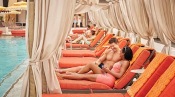 Seasonal outdoor pool, cabanas (surcharge), pool umbrellas