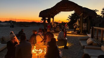 Outdoor pool, open 8:00 AM to midnight, pool umbrellas, sun loungers