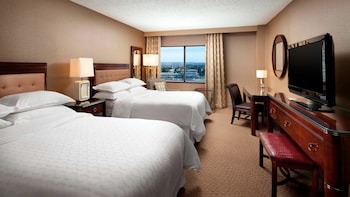 Premium bedding, pillow-top beds, in-room safe, desk