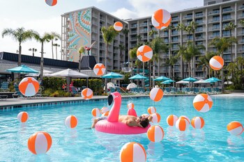 2 outdoor pools, a heated pool, cabanas (surcharge), sun loungers