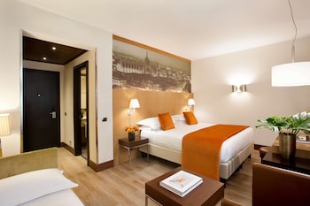 Camera Deluxe con letto matrimoniale o 2 letti singoli, balcone | 1 camera, minibar, una cassaforte in camera, una scrivania