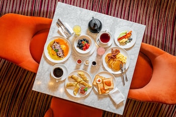 3 restaurants, breakfast, lunch, dinner served; Latin American cuisine