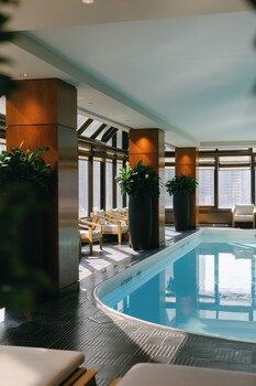 3 bars/lounges, rooftop bar, lobby lounge