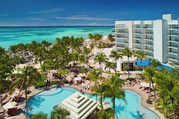 2 outdoor pools, open 7 AM to 7 PM, cabanas (surcharge), pool umbrellas