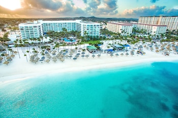 2 outdoor pools, open 7 AM to 7 PM, cabanas (surcharge), pool umbrellas