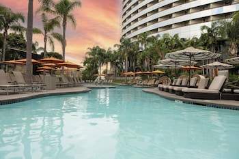 2 outdoor pools, open 6 AM to 10:00 PM, cabanas (surcharge)