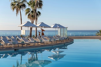 2 outdoor pools, cabanas (surcharge), pool umbrellas
