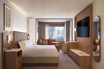 Premium bedding, down comforters, pillowtop beds, in-room safe