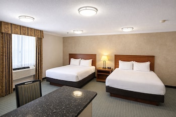 Suite, 1 King Bed, Non Smoking, Jetted Tub | Pillowtop beds, desk, laptop workspace, iron/ironing board