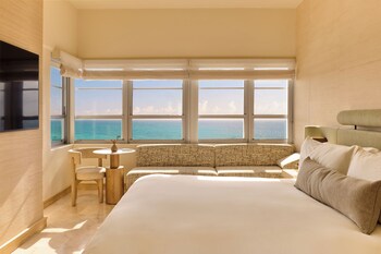 Private beach, white sand, free beach cabanas, sun loungers
