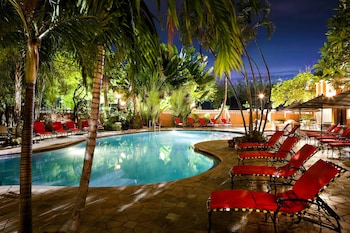 Outdoor pool, open 7:00 AM to 10:00 PM, pool umbrellas, sun loungers