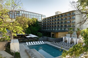 Outdoor pool, open 9:00 AM to 10:00 PM, pool cabanas (surcharge)
