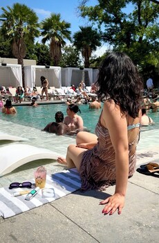 Outdoor pool, open 9:00 AM to 10:00 PM, cabanas (surcharge)